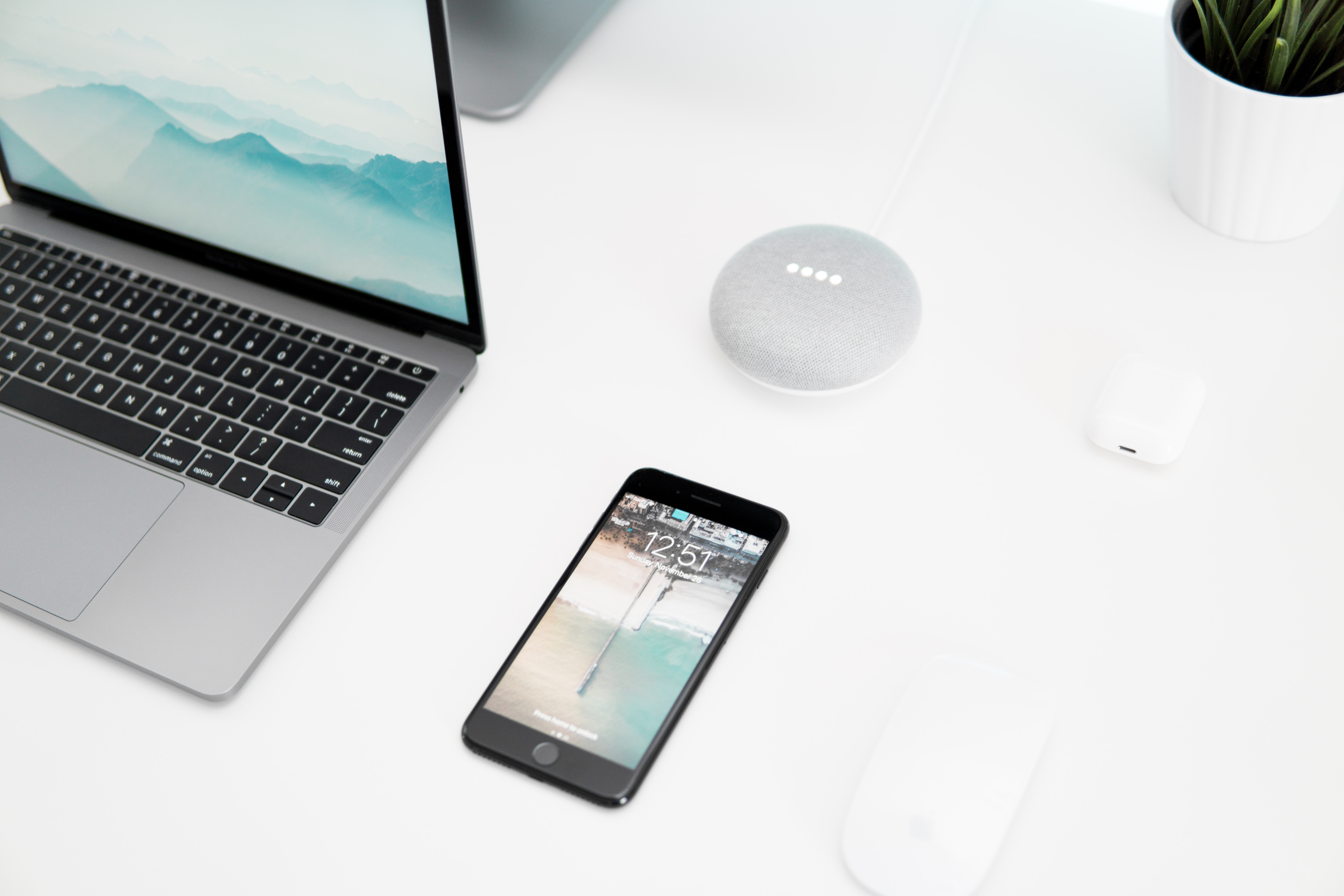 Phone and laptop on a desk